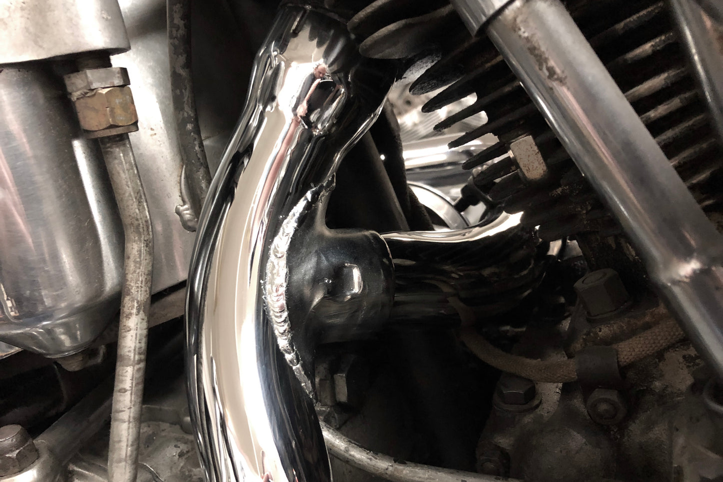 Panhead Rear head pipe for 2 into 2 systems