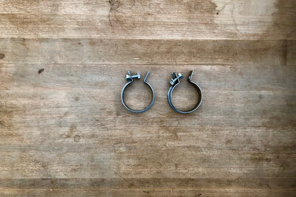 65519-52 Sportster exhaust port clamps